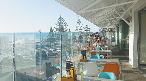 New bar patrons drink in ocean views