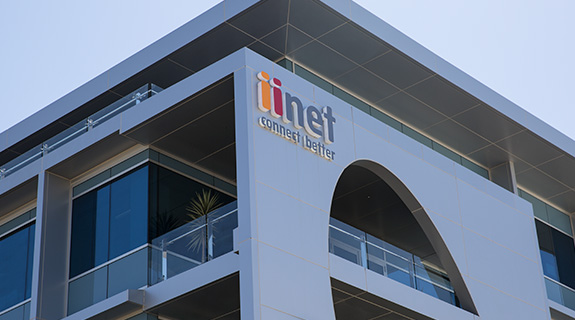 iiNet closes above $10 on bid war