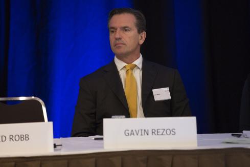 Rezos cuts back board commitments