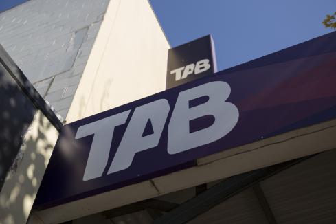 TAB posts lift in profit