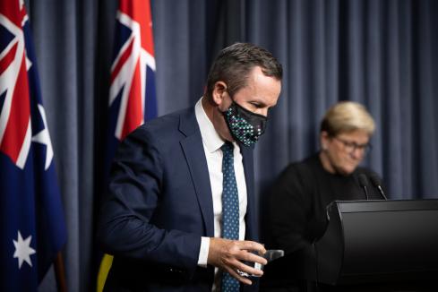 McGowan defends mask mandate as cases hold steady