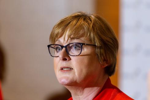 WA senator warns Higgins, sues partner