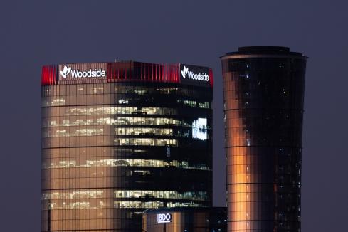 Woodside profit slides on lower prices