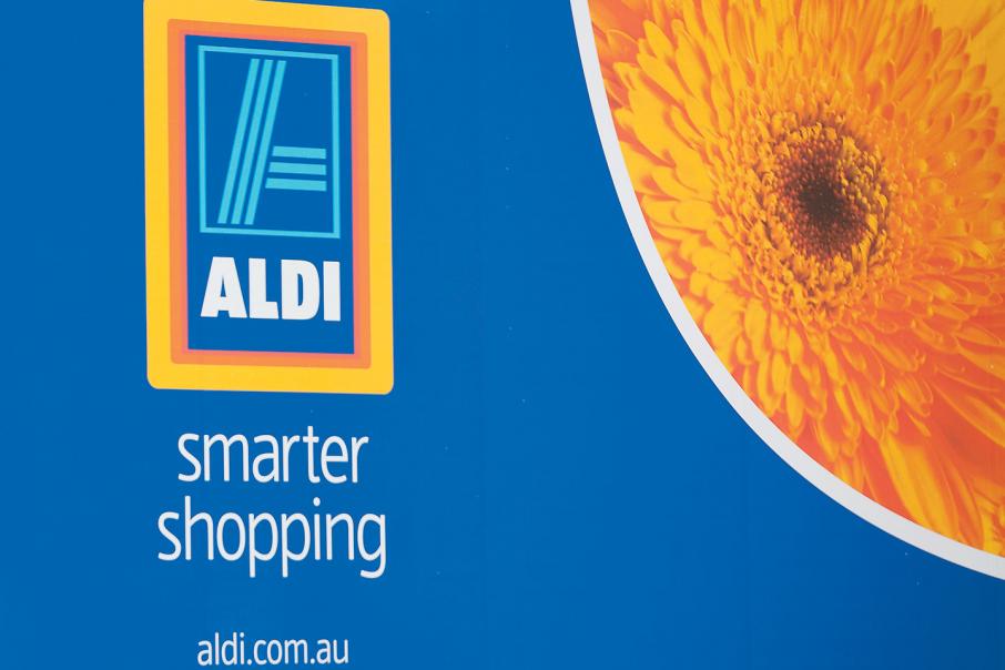 Supermarket giants squeezed from both sides