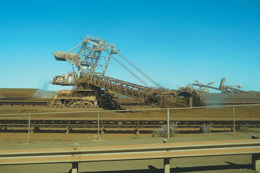 Price slump hits iron ore revenue