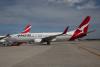 Qantas HY loss widens to $1.28 billion